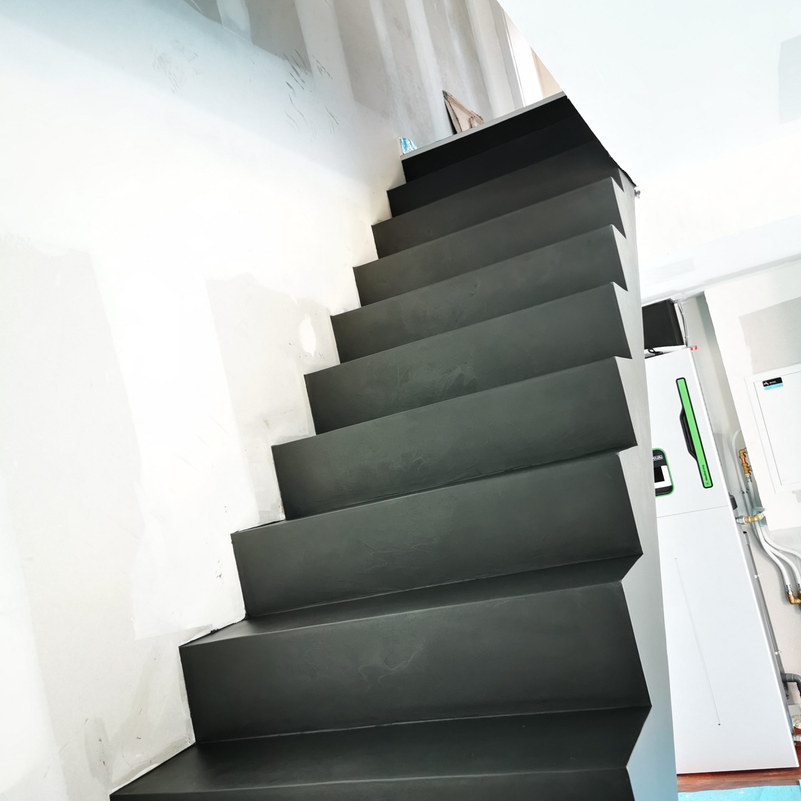 Beton cire sur l'arrivée d'un escalier en béton