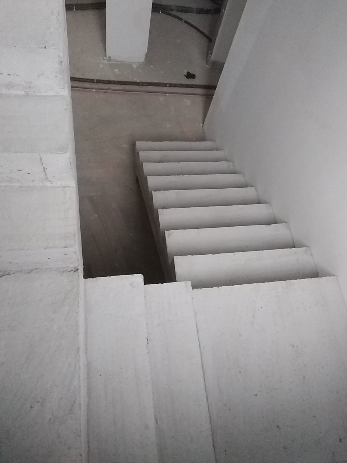 Dessus de l'escalier avec ses paliers intermédiaires